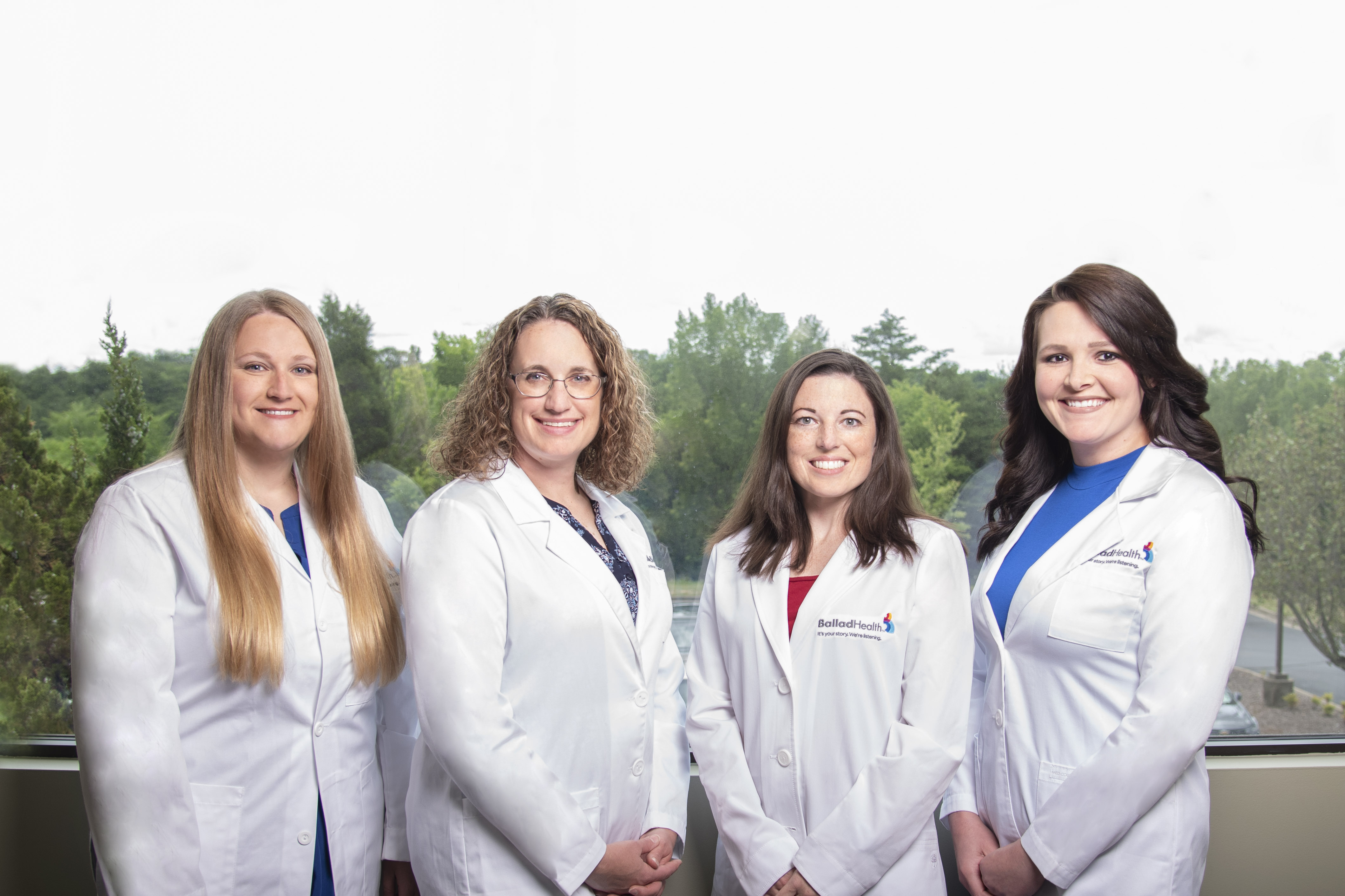 three female health care professionals